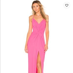 Never worn, bright pink gown with slit.